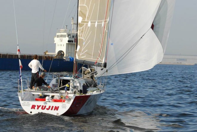 Murray Bucknall (on helm) & Jon Sayer bring RYU-JIN to finish line. Photo: Tak Yamazaki © Melbourne Osaka Cup